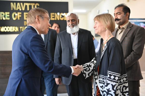 The Ambassador of the Republic of Korea to Pakistan, H.E. Mr. Park Ki Jun, and UNHCR Representative, Ms. Philippa Candler shaking hands after signing the agreement. © UNHCR/Asif Shahzad